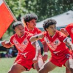 Rugby players in the Tonga vs Samoa match battling with power and passion.