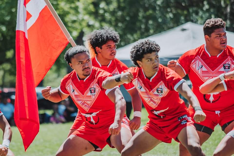 Rugby players in the Tonga vs Samoa match battling with power and passion.