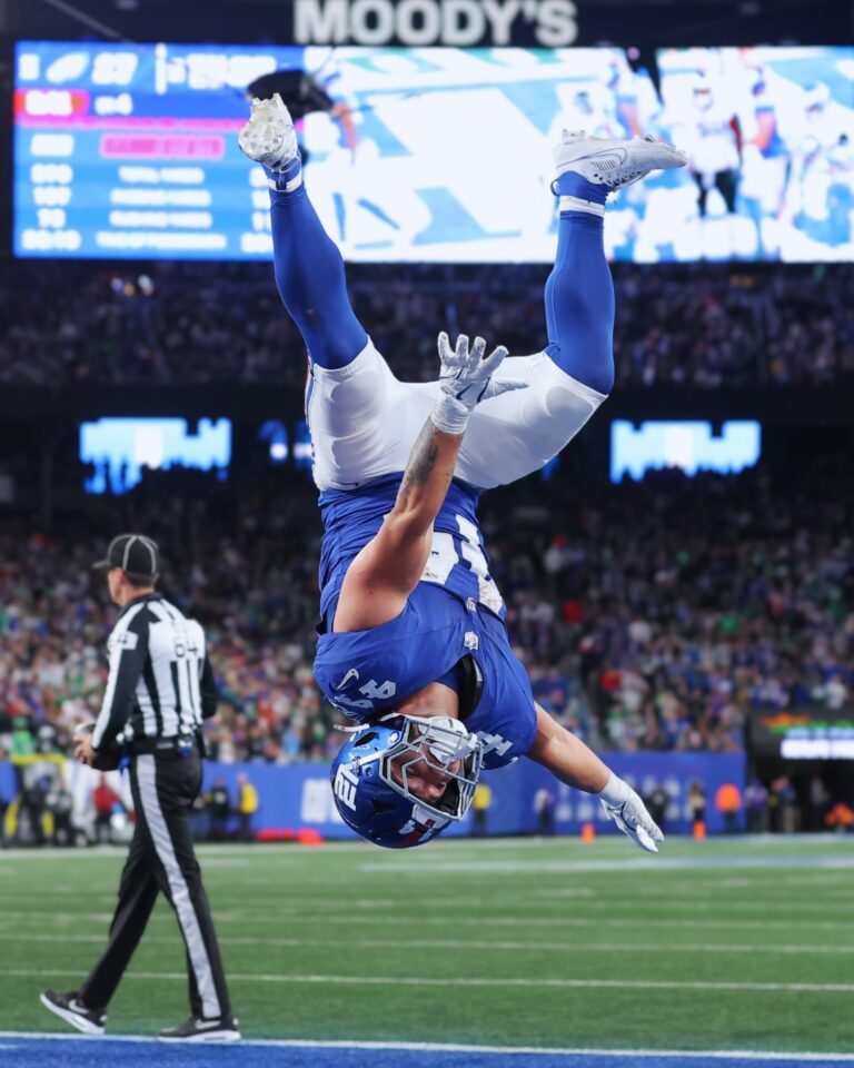 New York Giants quarterback Jaxson Dart sprints for a 20-yard touchdown during the Giants vs Eagles upset at MetLife Stadium on October 9, 2025.