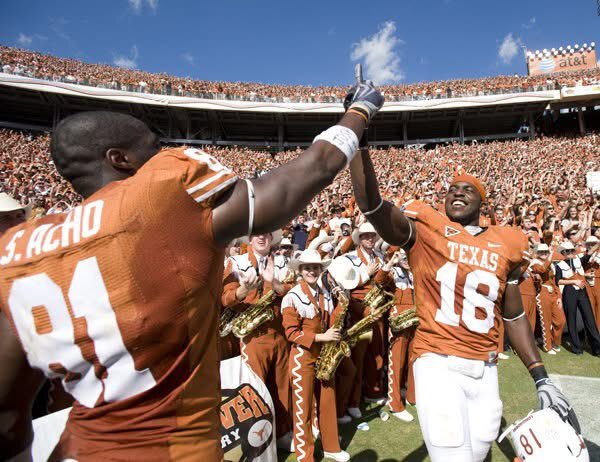 Oklahoma vs Texas game action: Arch Manning throws a 12-yard touchdown pass to DeAndre Moore Jr. during the Red River Rivalry on October 11, 2025.