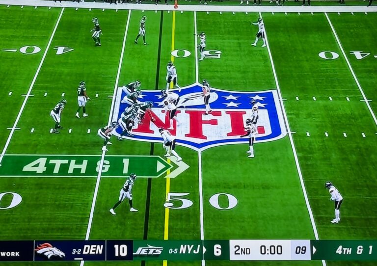 Bo Nix throws a 16-yard touchdown pass to Nate Adkins during the Jets vs Broncos game on October 12, 2025.