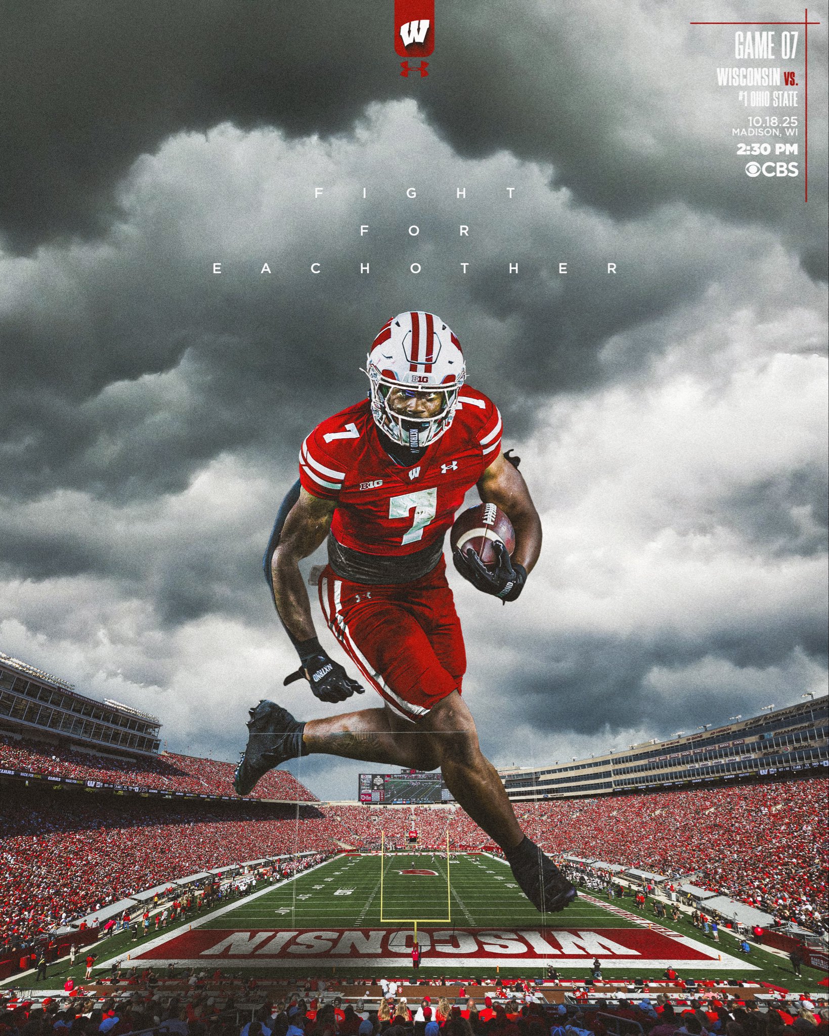 Quarterback leading Ohio State vs Wisconsin rivalry game action.