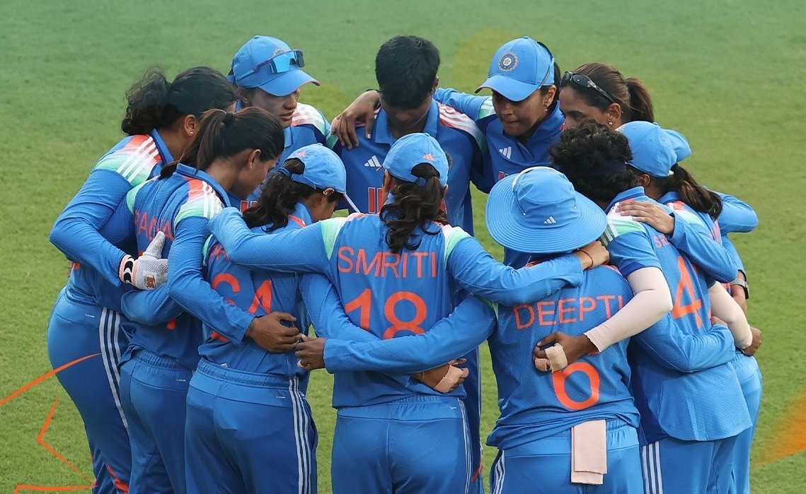 England vs India Women players competing fiercely during an international match.