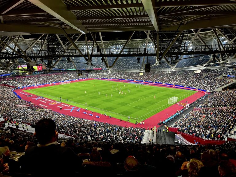 West Ham and Brentford players contesting a header during a Premier League match at London Stadium