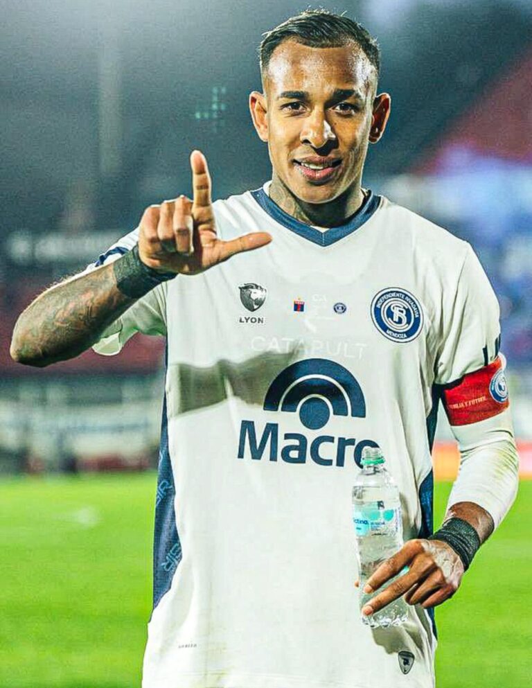 Independiente Rivadavia and River Plate players in action at a packed football stadium, showcasing the intensity of their Argentine league match.