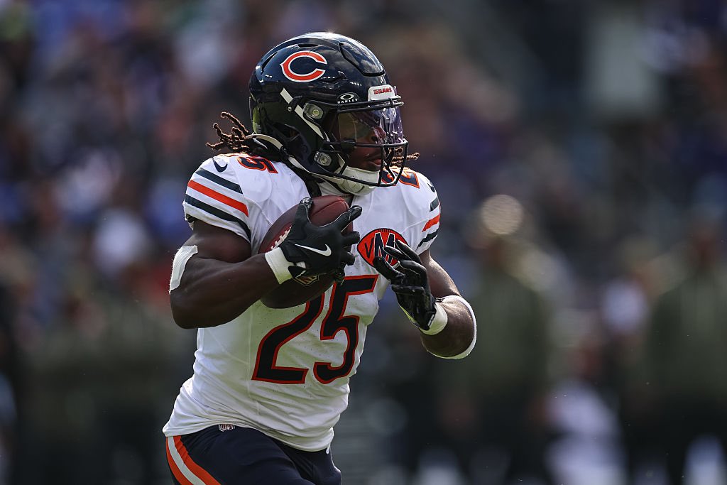 Players from Bears vs Bengals lineup face-off during an intense NFL game.