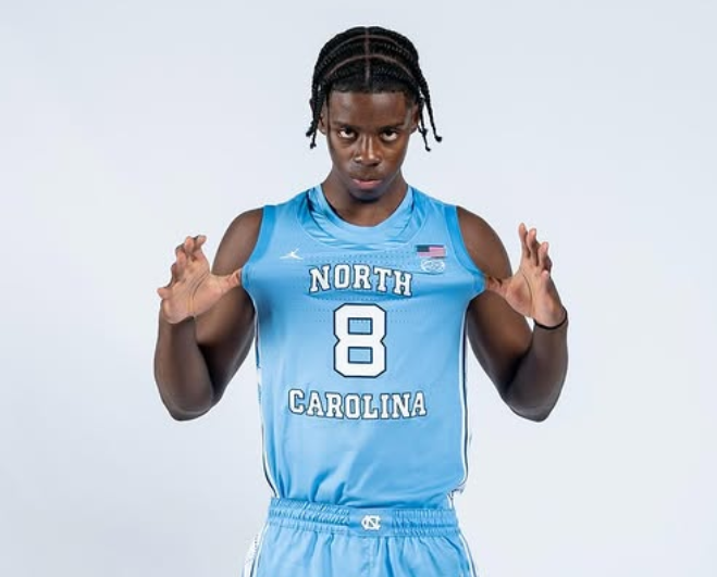 Caleb Wilson UNC basketball star celebrates after leading the Tar Heels to victory over Kansas.